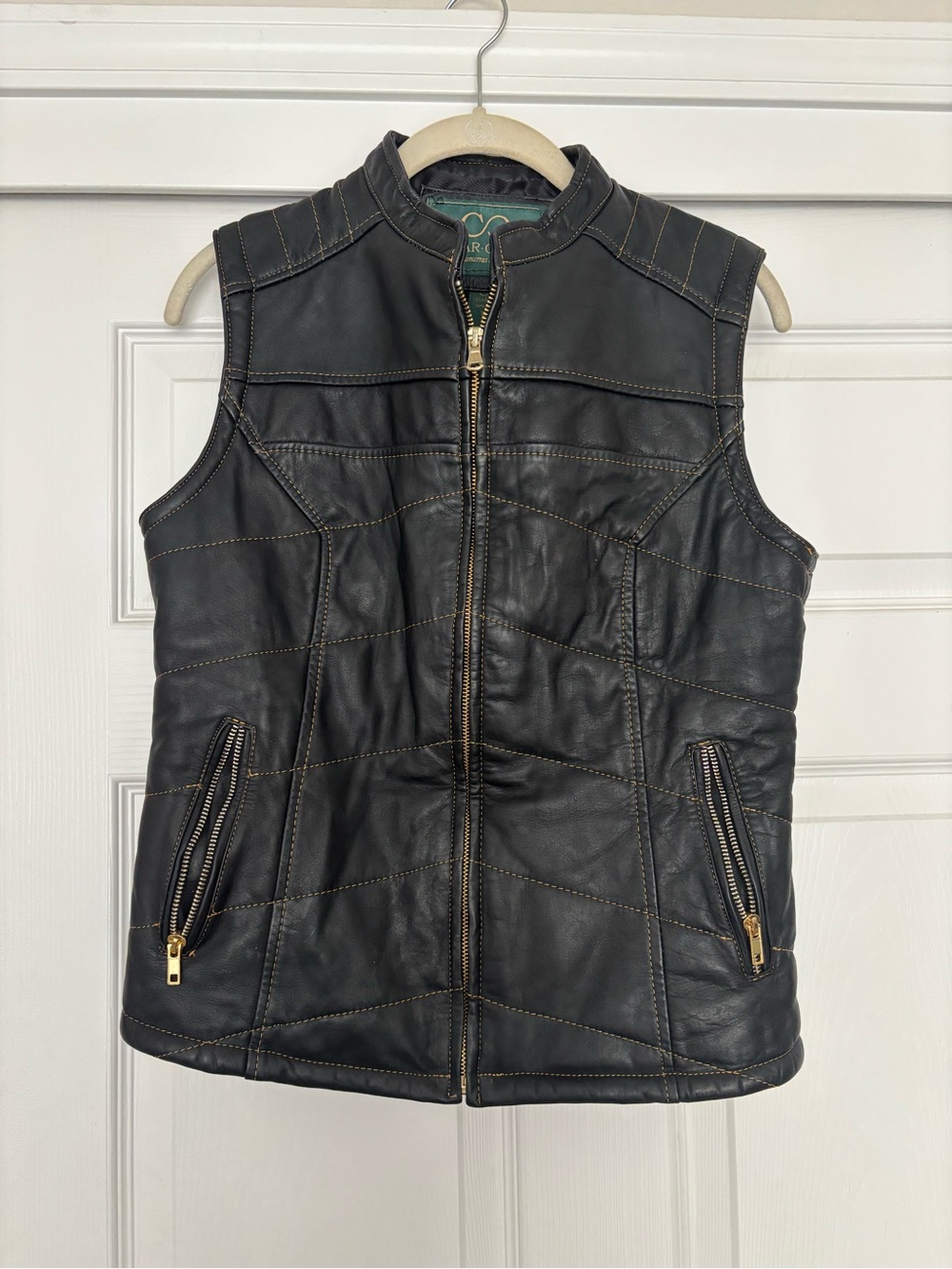 Sleeveless Black Quilted Leather Vest with Gold Zippers